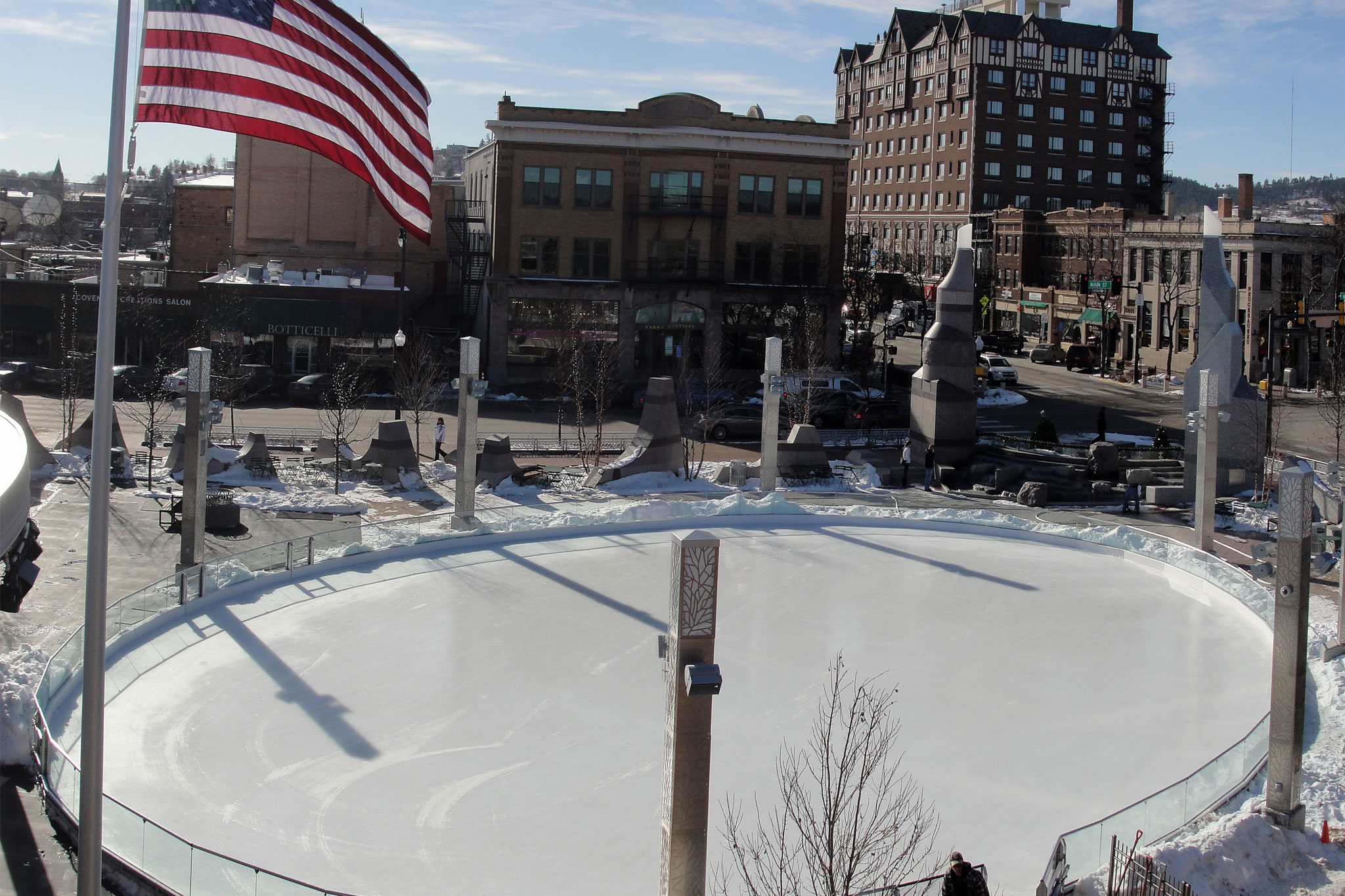 The interactive fountain is transformed into an ice rink every winter. The transformation crew uses standard garden hoses to create this frozen attraction.