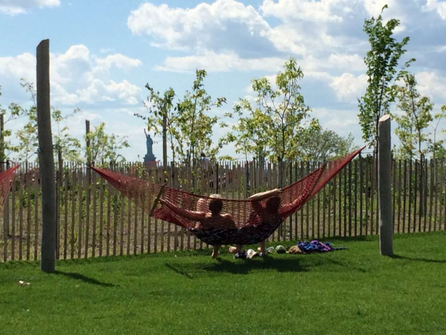 The Hammocks overlooking The Statue of Liberty give Governor's Island visitors a reminder of the origins of the island. Photo via fungur.com